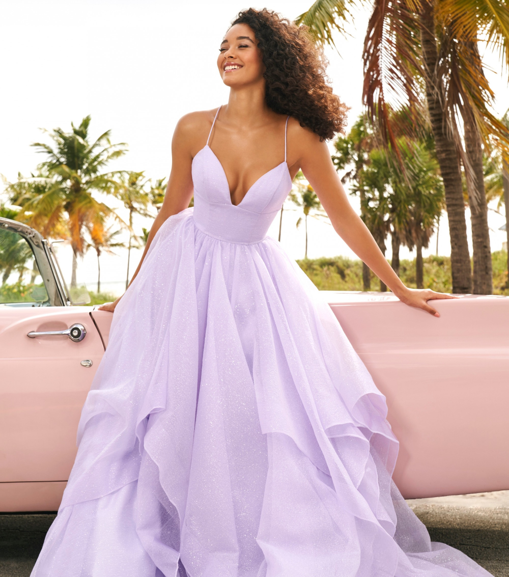 Model wearing a lignt gown